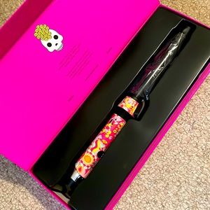 Amika rotating curling iron